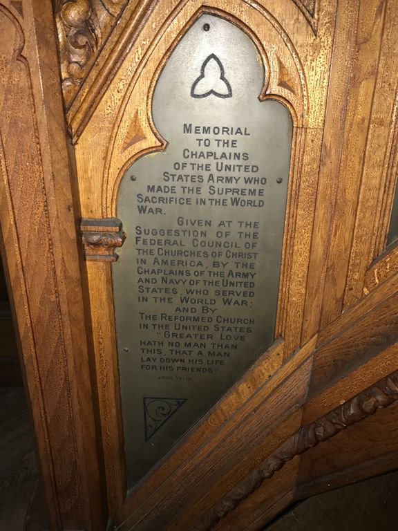The pulpit was given in memory of the chaplins who died in service during WWI